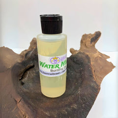 Bottle of red Watermelon Burning Oil on a light background.