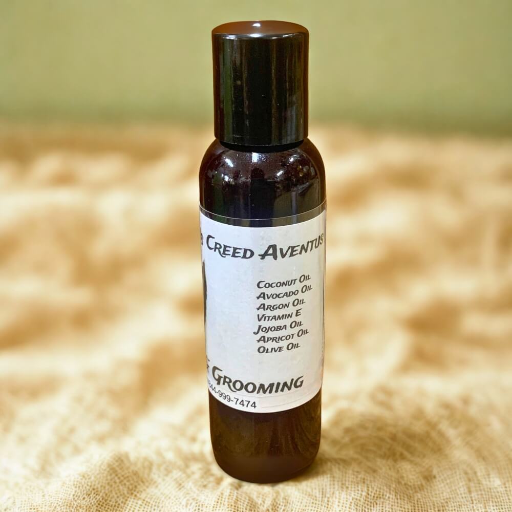 Seyni’s Creed Aventus Beard Oil bottle with a masculine dropper design.